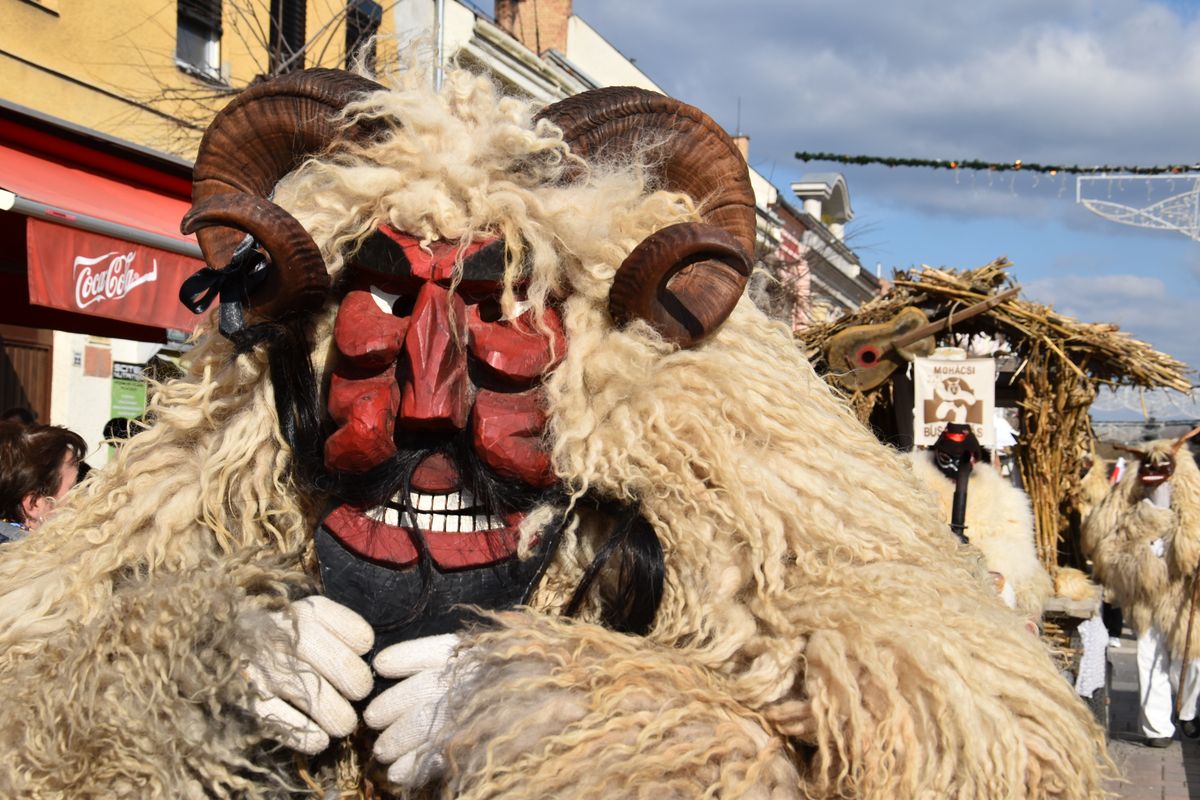 Busójárás carnival folk festival with traditional Busó masks and fur costumes in Mohács, Hungary