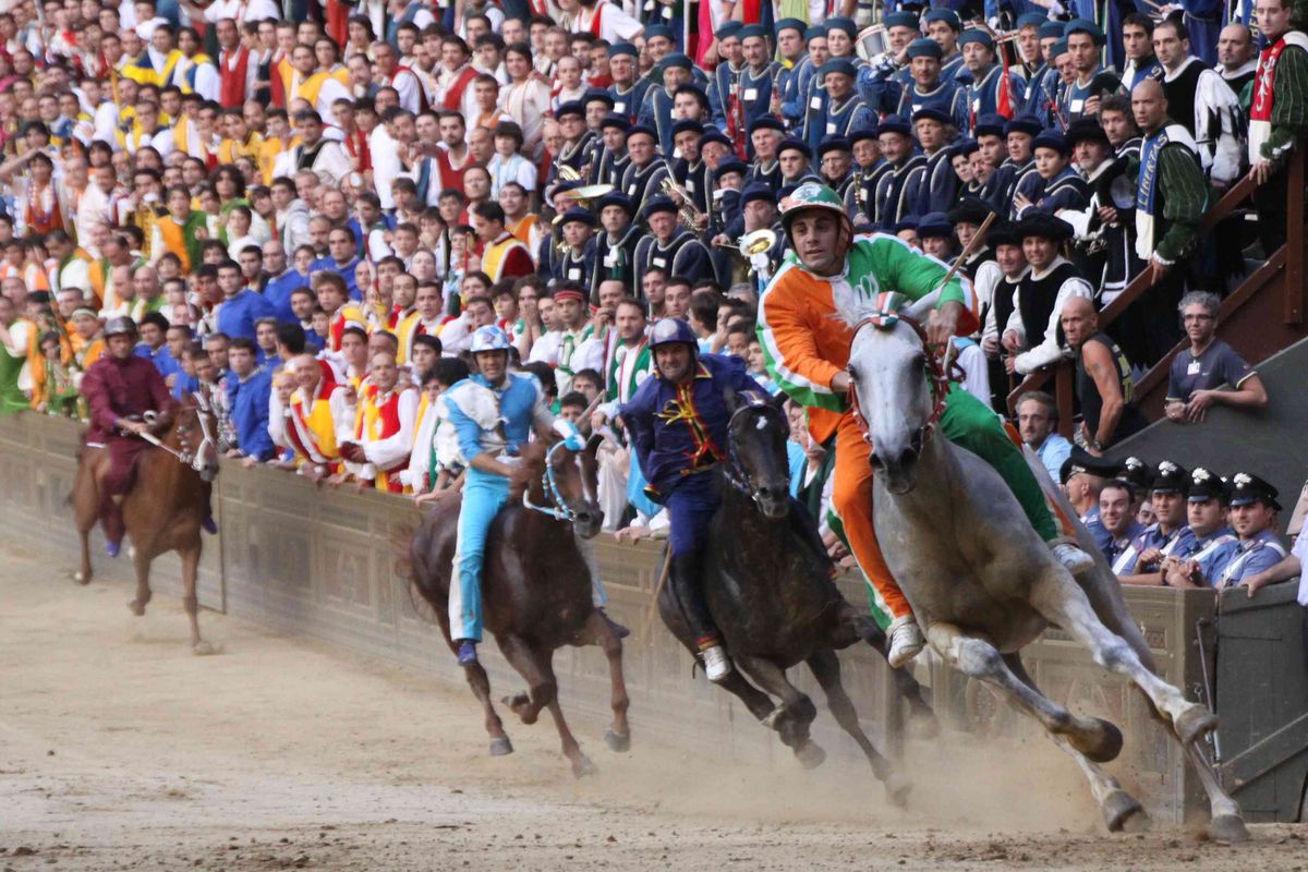 Palio di Siena horse race in Piazza del Campo, Siena, Italy