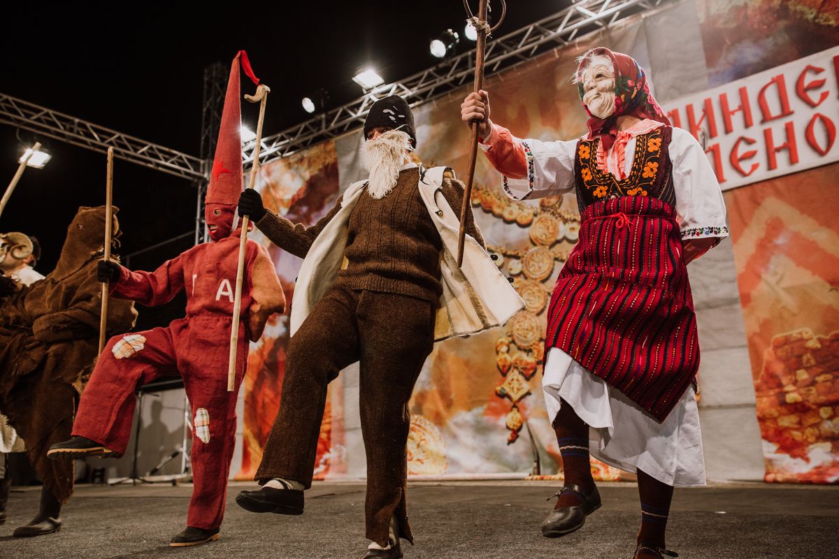 Traditional masked dancers at Vevčani Carnival performing at Ilinden Days festival in Bitola, North Macedonia