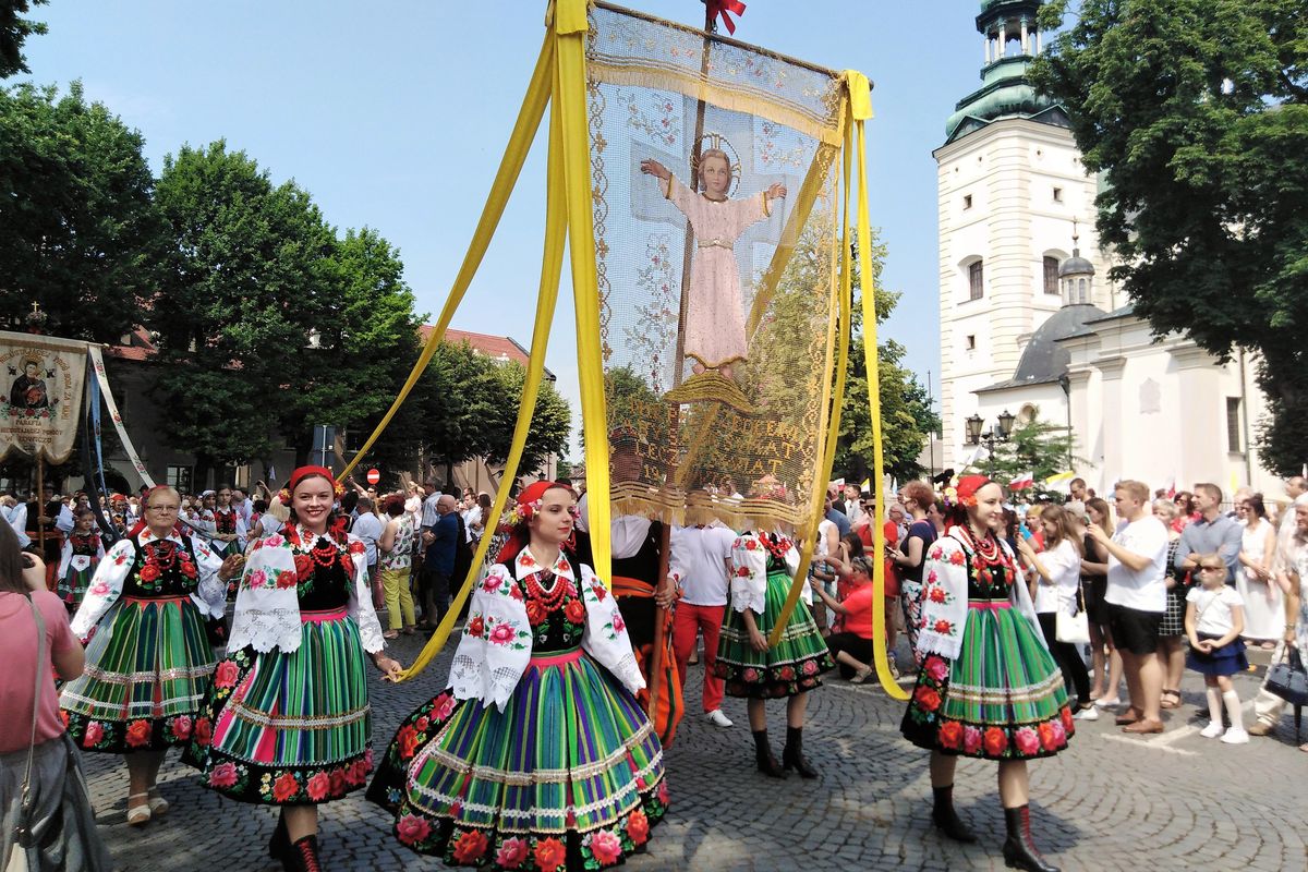 Corpus Christi (Boże Ciało) procession in Łowicz with traditional striped folk costumes