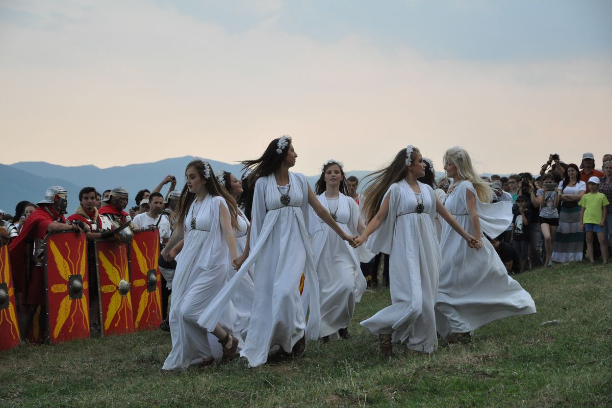 Traditional Sânziene circle dance ritual at Cricău Festival in Transylvania, Romania